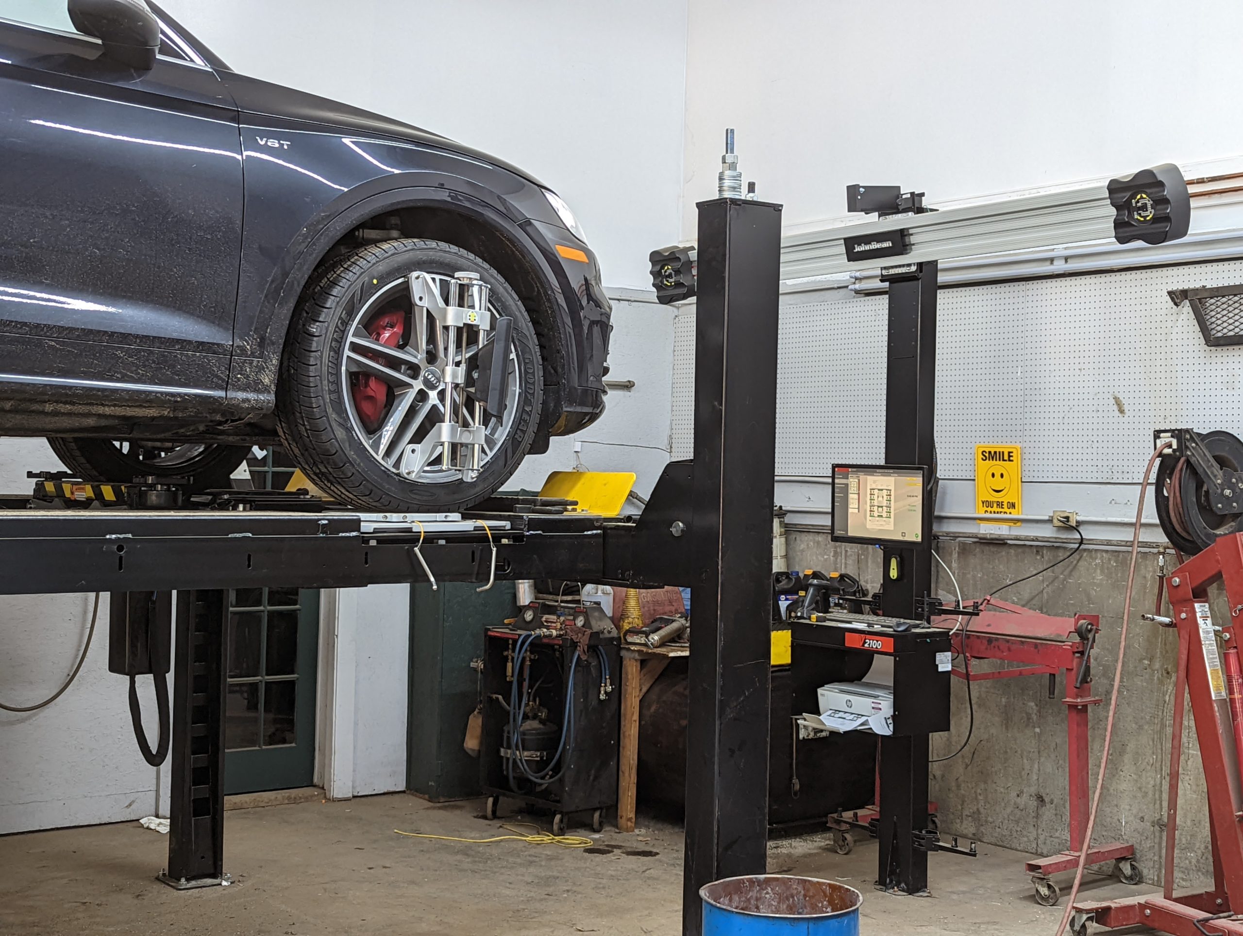 A vehicle on the alignment equipment inside MD-Brown’s repair shop